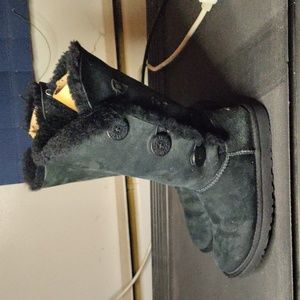 UGG woman size 7 black tall boots with buttons up the side